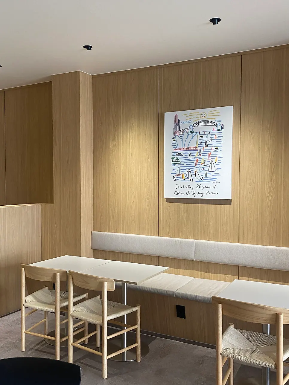 First-floor 2-top seats and coffee beans for sale
