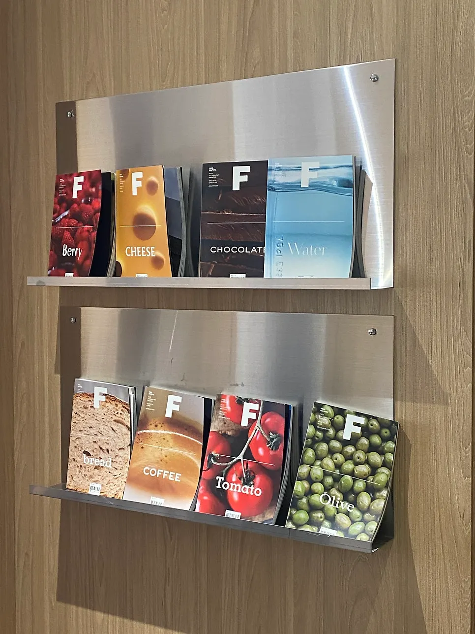 Second-floor self-service bar with water dispenser, small plates, napkins
