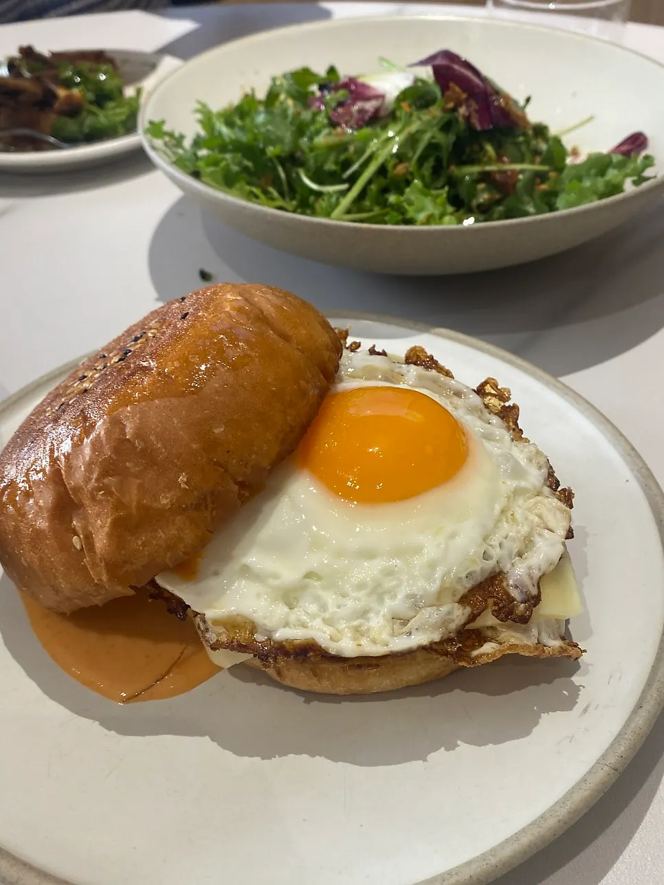 Baguette topped with shakshuka sauce