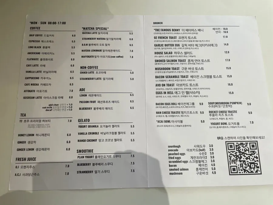 Menu board listing drinks and coffee