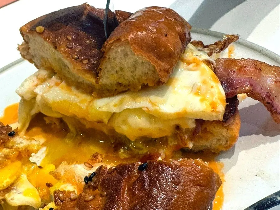 Plate of ham cheese toast served with sauce