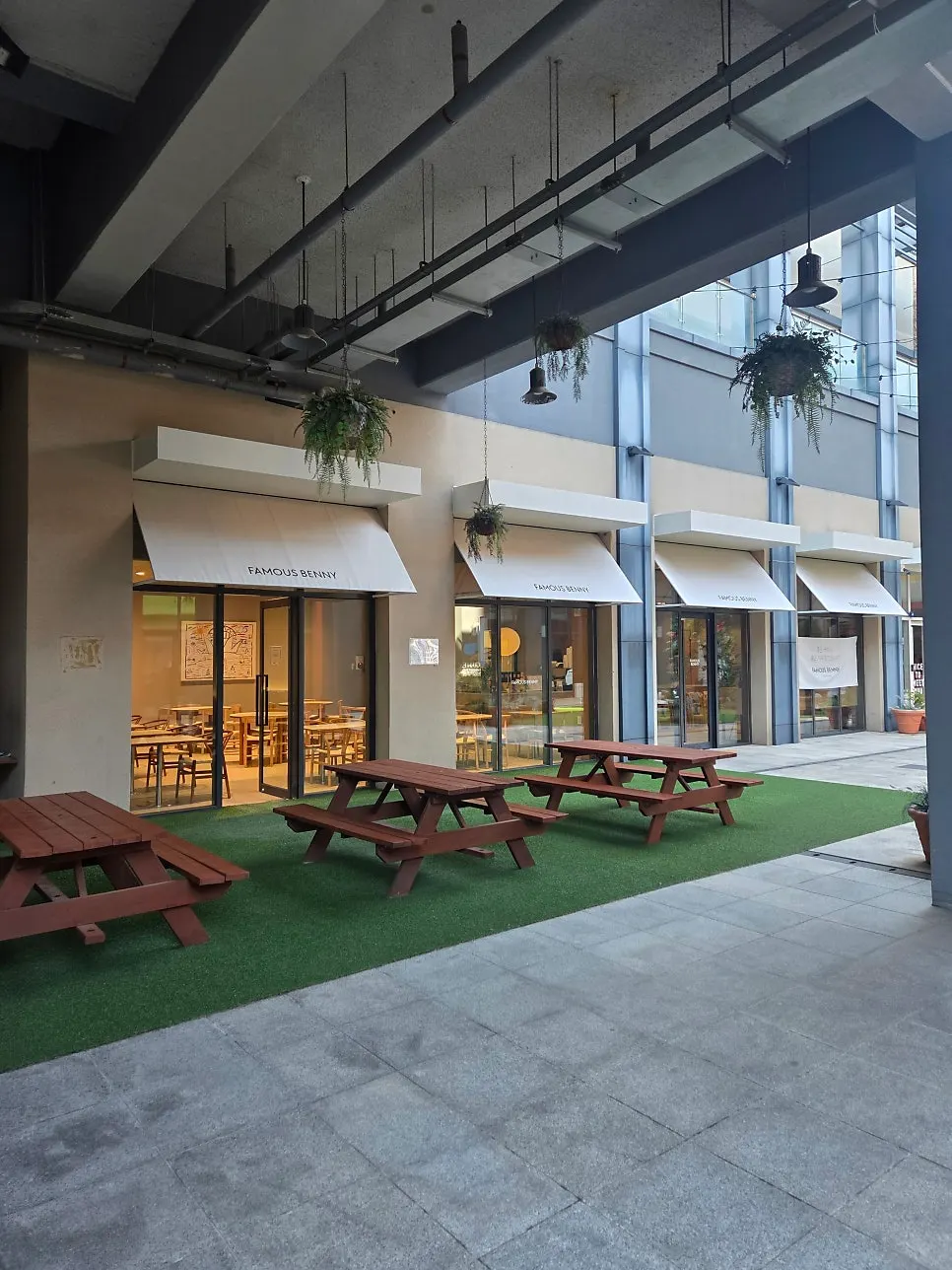 Outdoor tables in front of the café