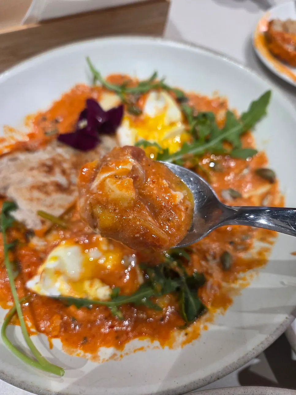 Eggs in Hell served with sourdough