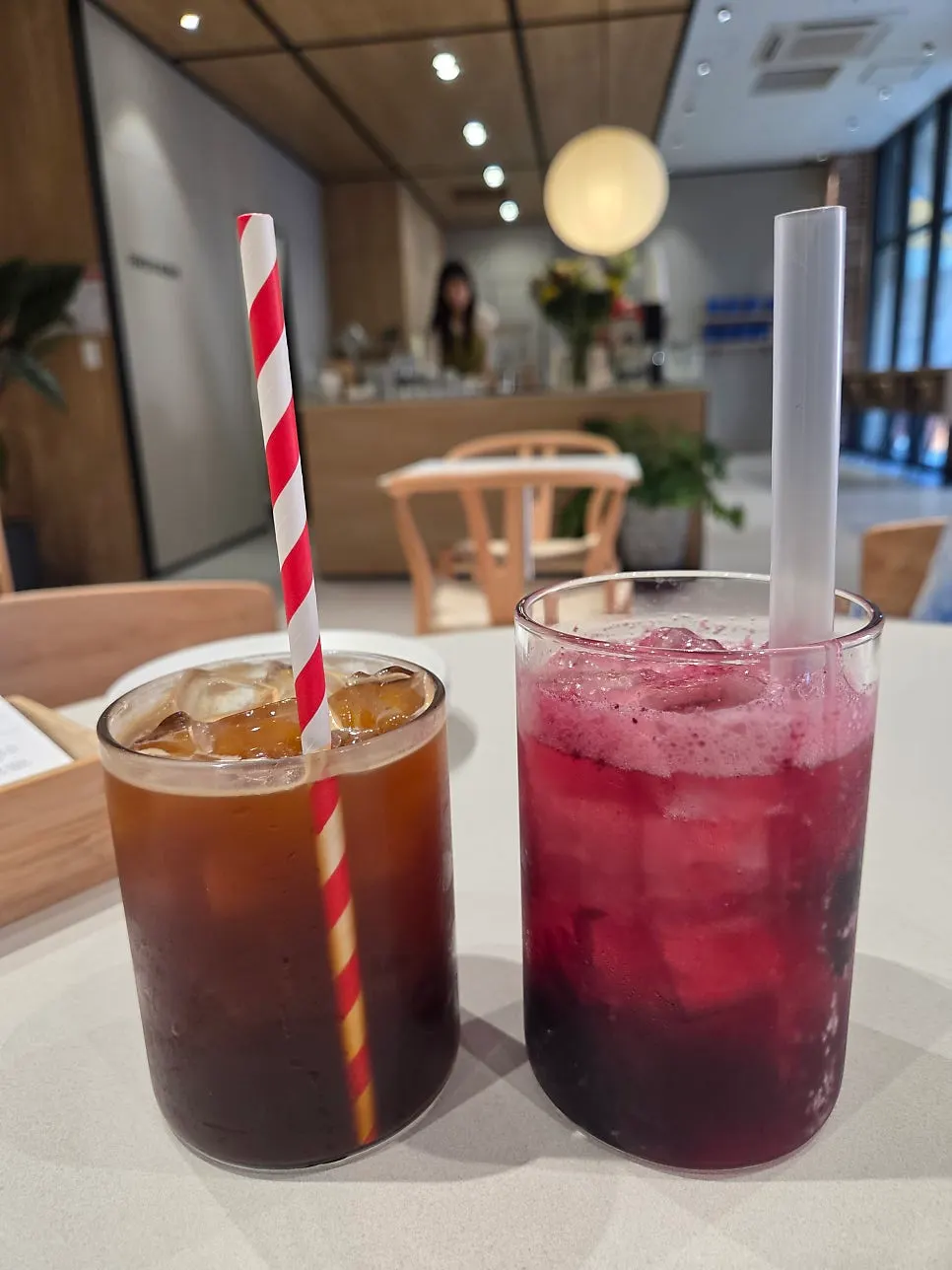 A glass of purple blueberry ade