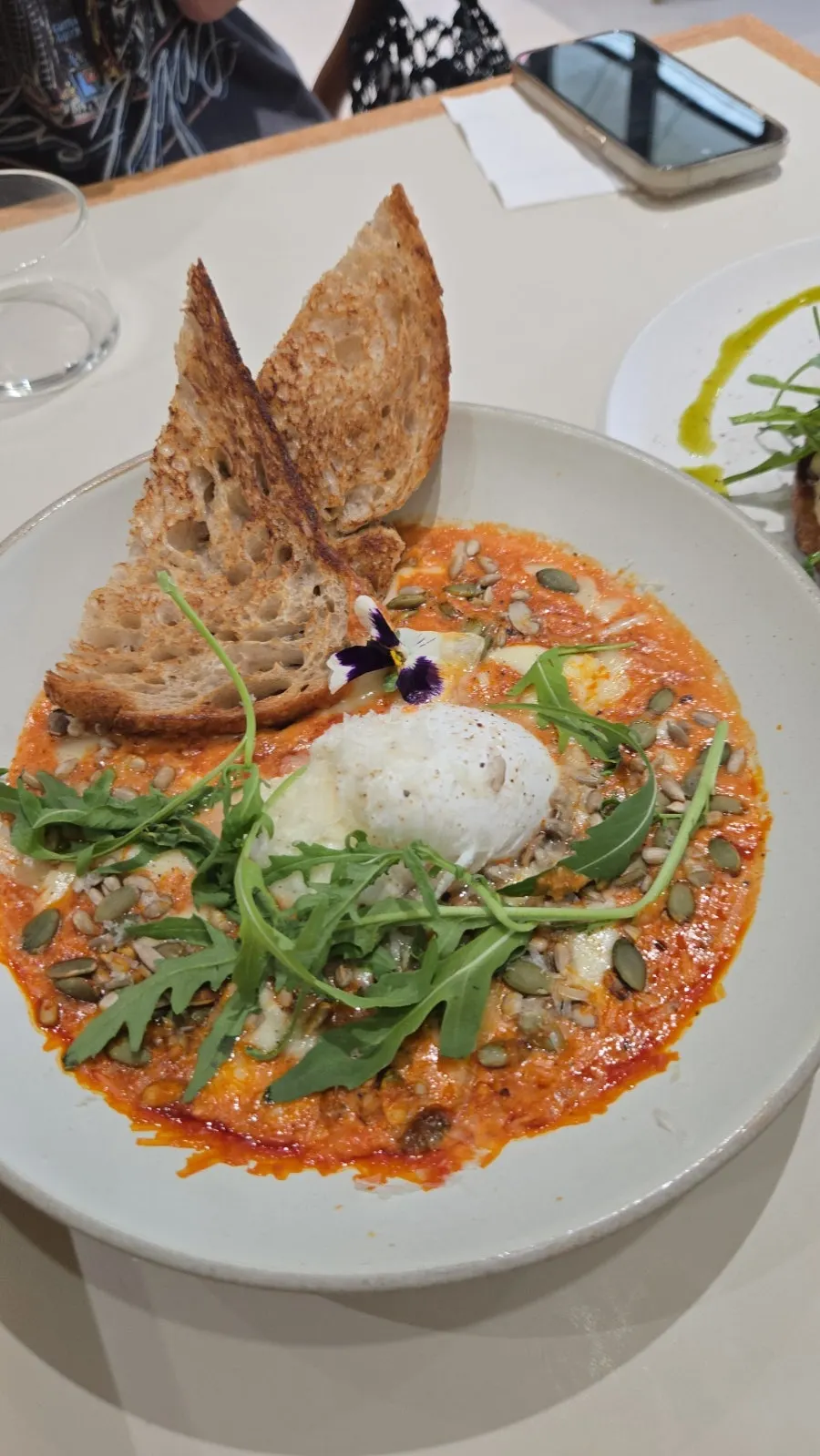 Eggs in hell with a thinner-style sauce