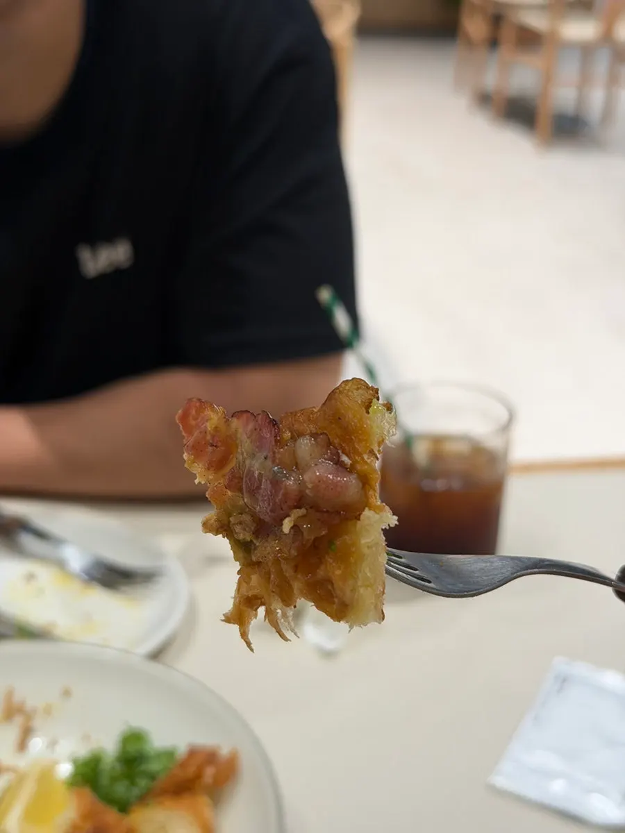 Thick, long strips of bacon on top