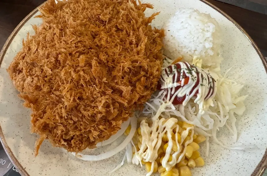 Onion katsu served with the sauce on the side
