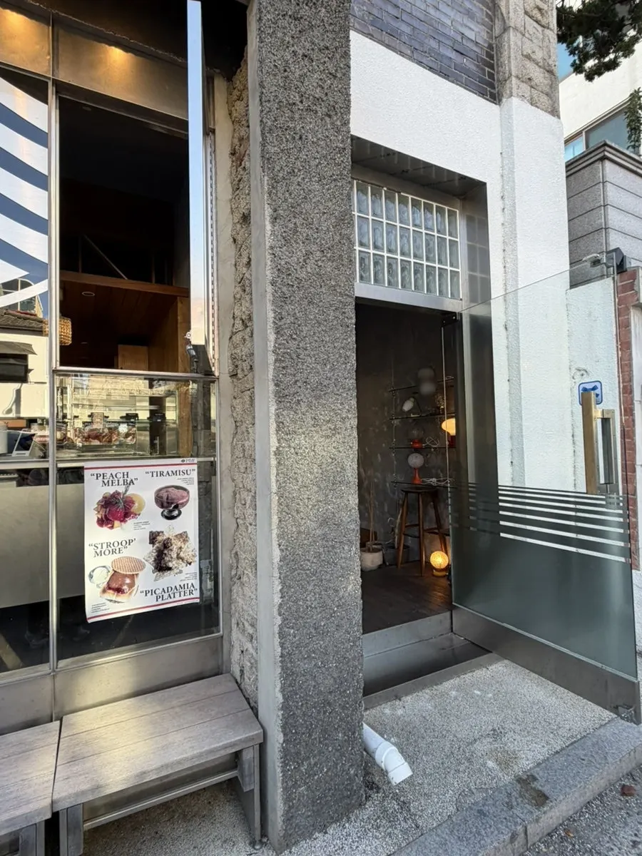 Pip Espresso Bar's renovated house building with outdoor stairs
