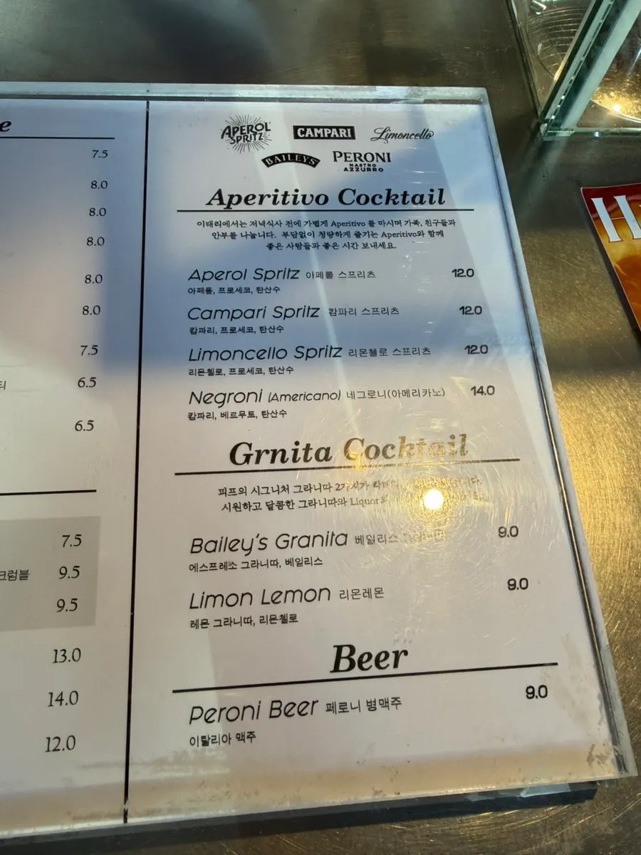 Coffee menu board with americano and lattes