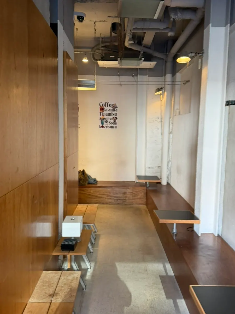 Interior of Pip Espresso Bar mixing wood tones and metal