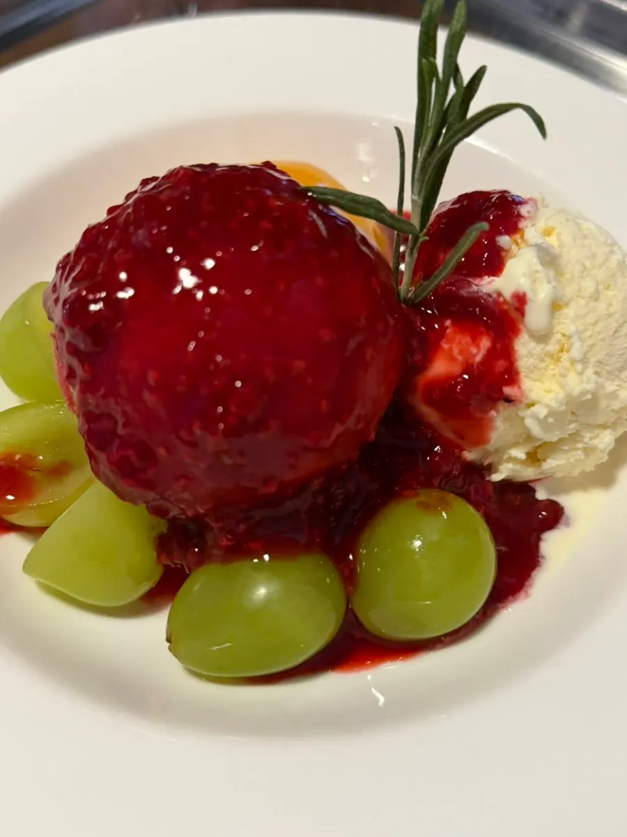 Panna salata topped with cream and pink salt