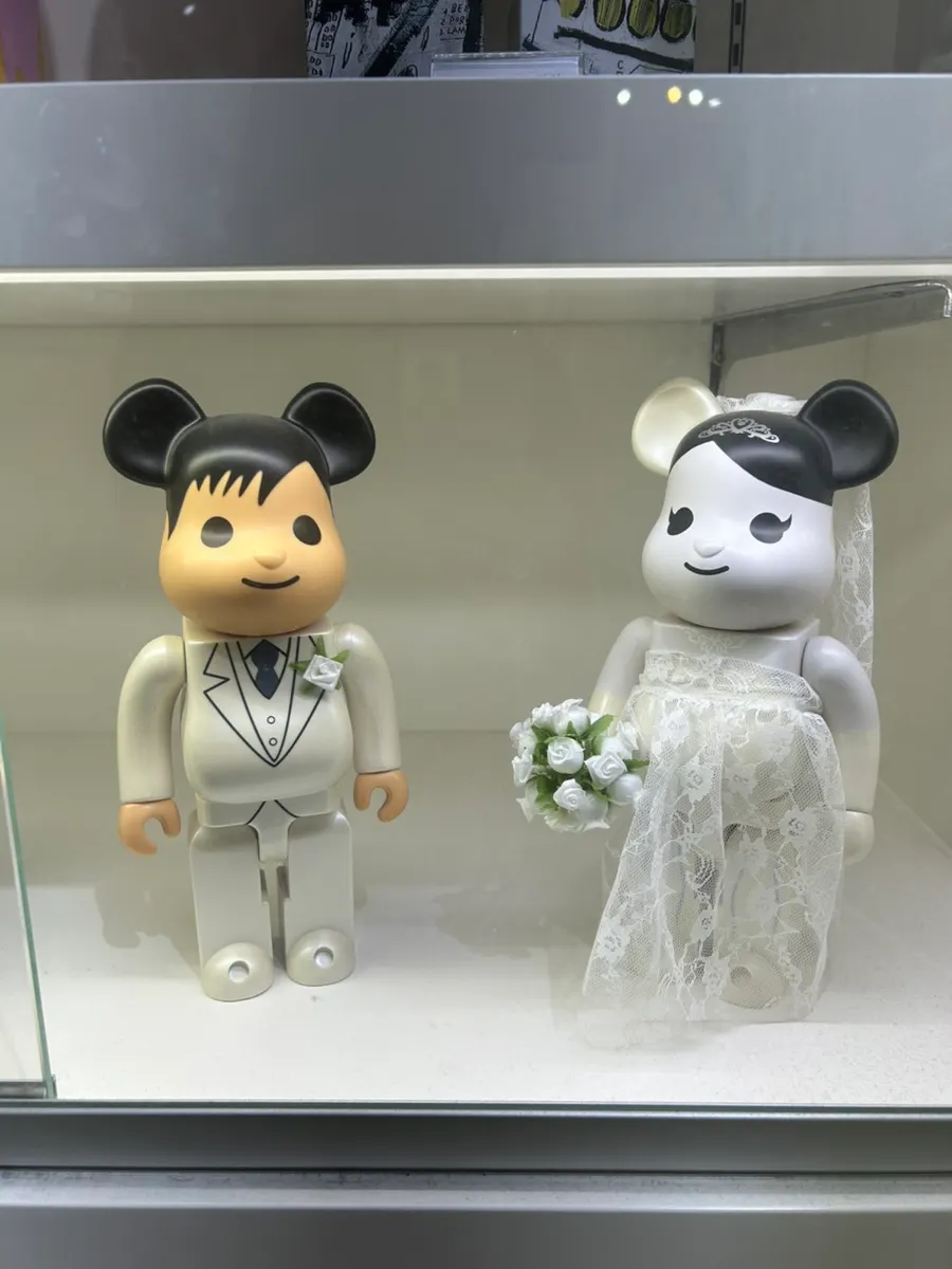A row of Bearbrick figures on display