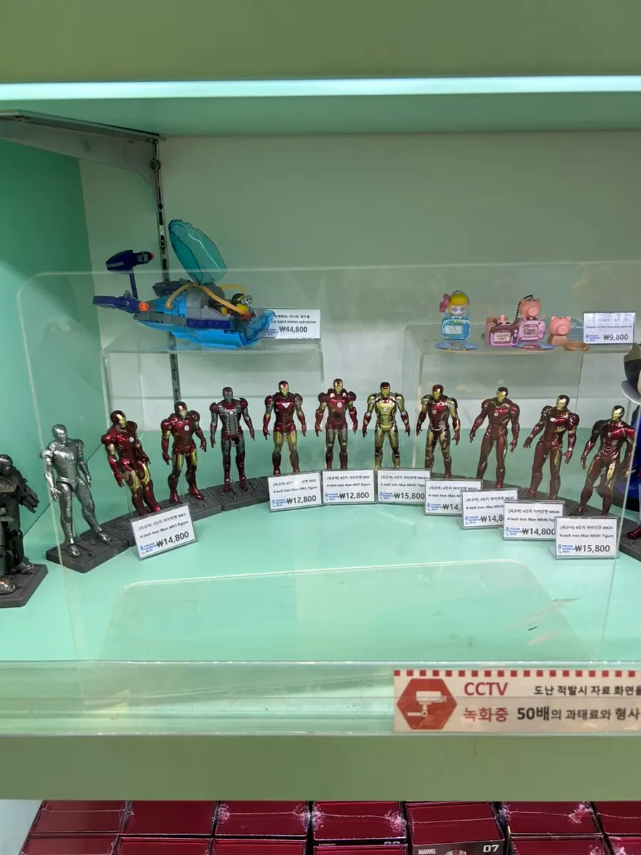 Merchandise shelves at the Figure Museum Jeju gift shop