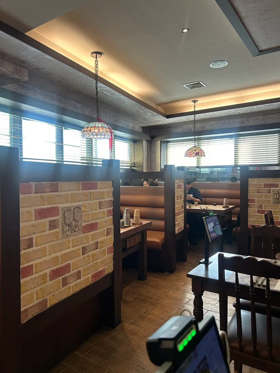 Interior of Filling Donkatsu Yongbong Branch spanning the 2nd and 3rd floors
