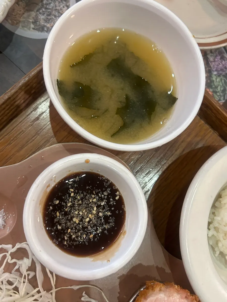 Various dipping sauces served with the tonkatsu
