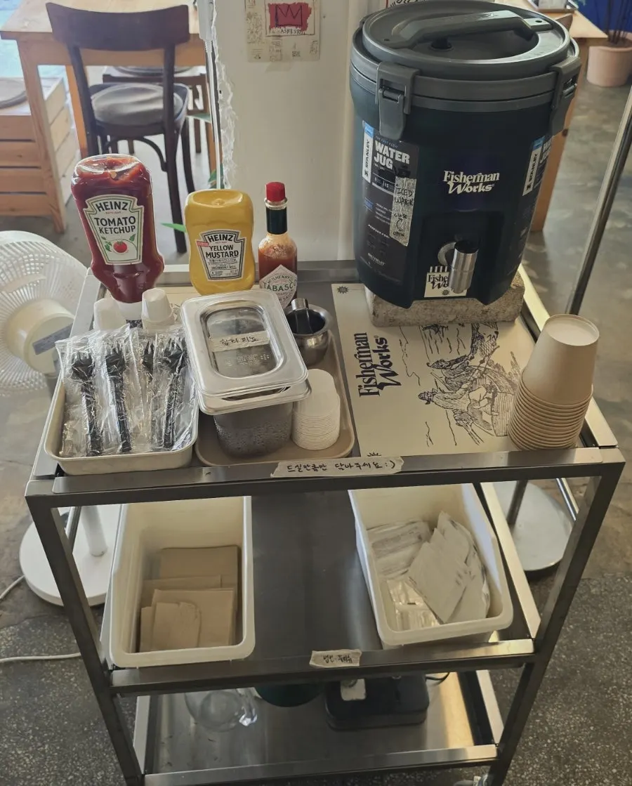 Self-serve bar with mustard and ketchup