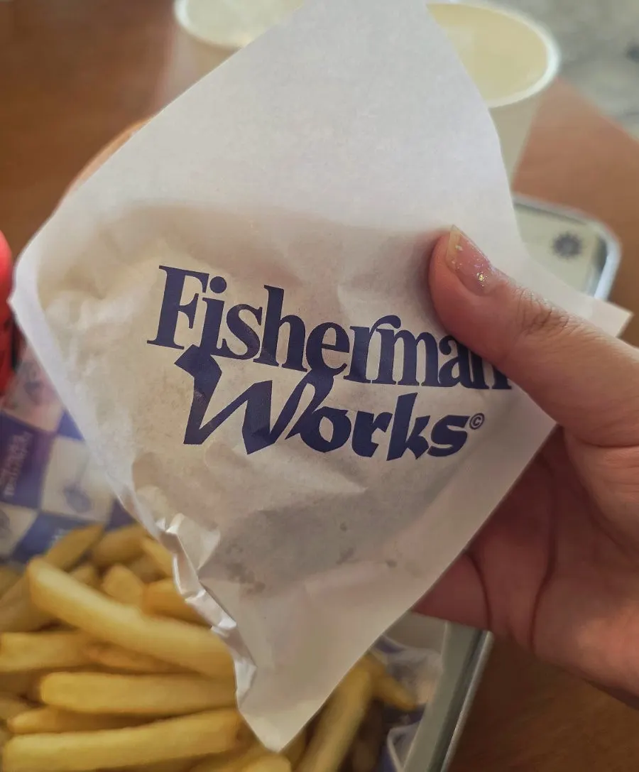 Fisherman Works burger wrapped in paper