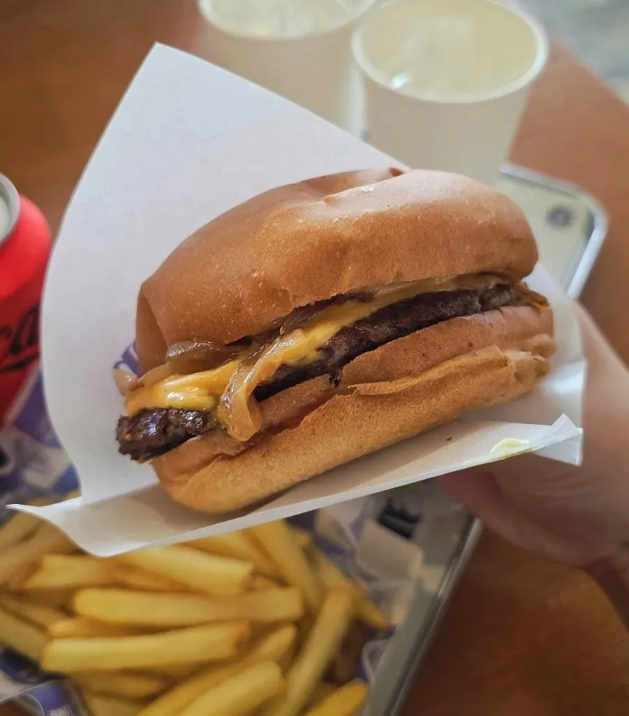 Cross-section of the Original Cheese Burger with melted cheese