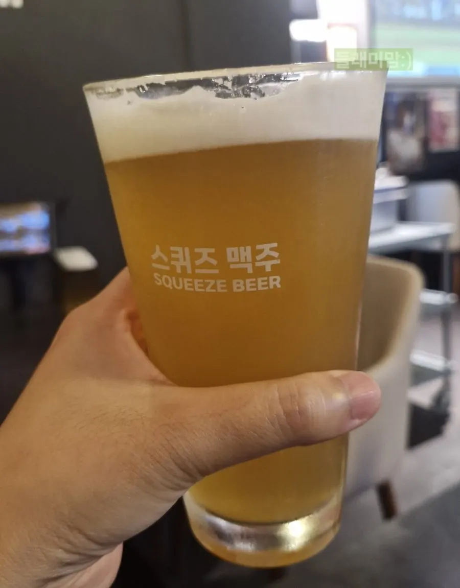Vertical shot of a draft beer glass on the table
