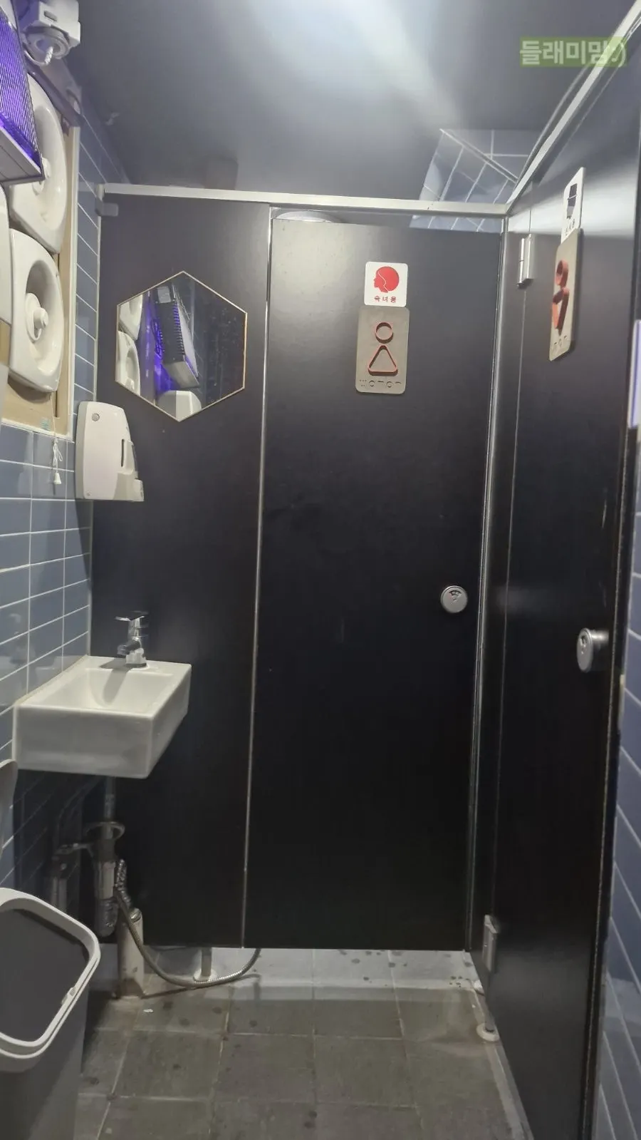 Interior of the restroom, divided into men's and women's sections