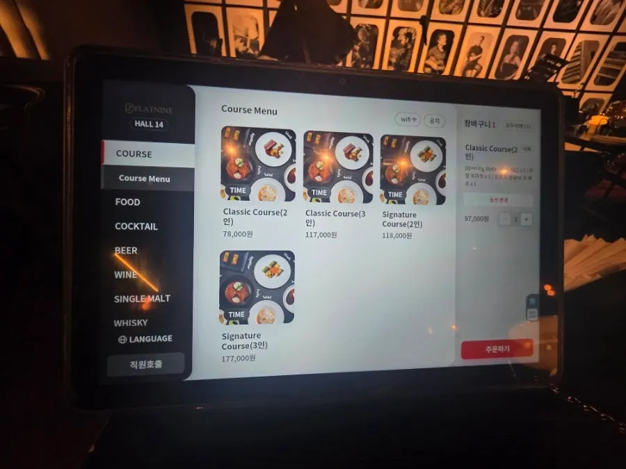 Flat Nine's course menu displayed on a table tablet