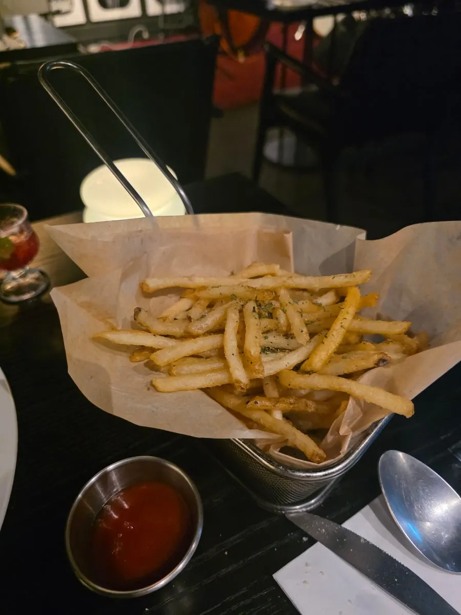 A plate of fries ordered as an extra