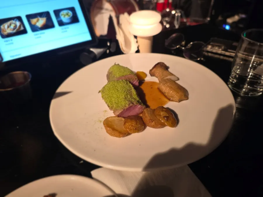 Tenderloin steak served with mushrooms and potatoes