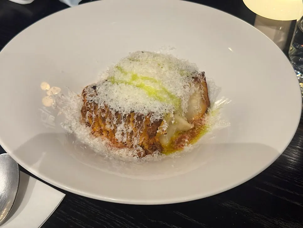 A plate of basil tomato mille-feuille lasagna