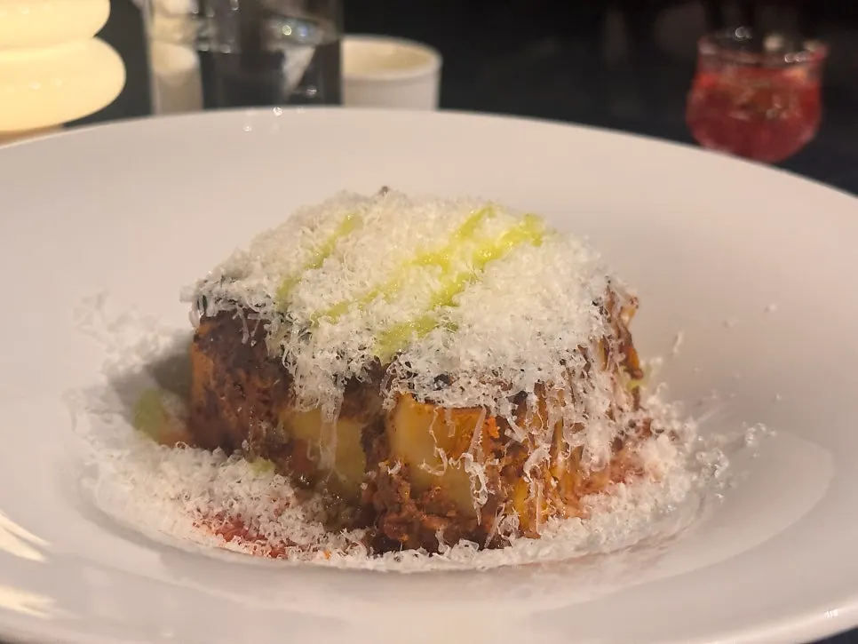 Mille-feuille lasagna topped with Grana Padano cheese