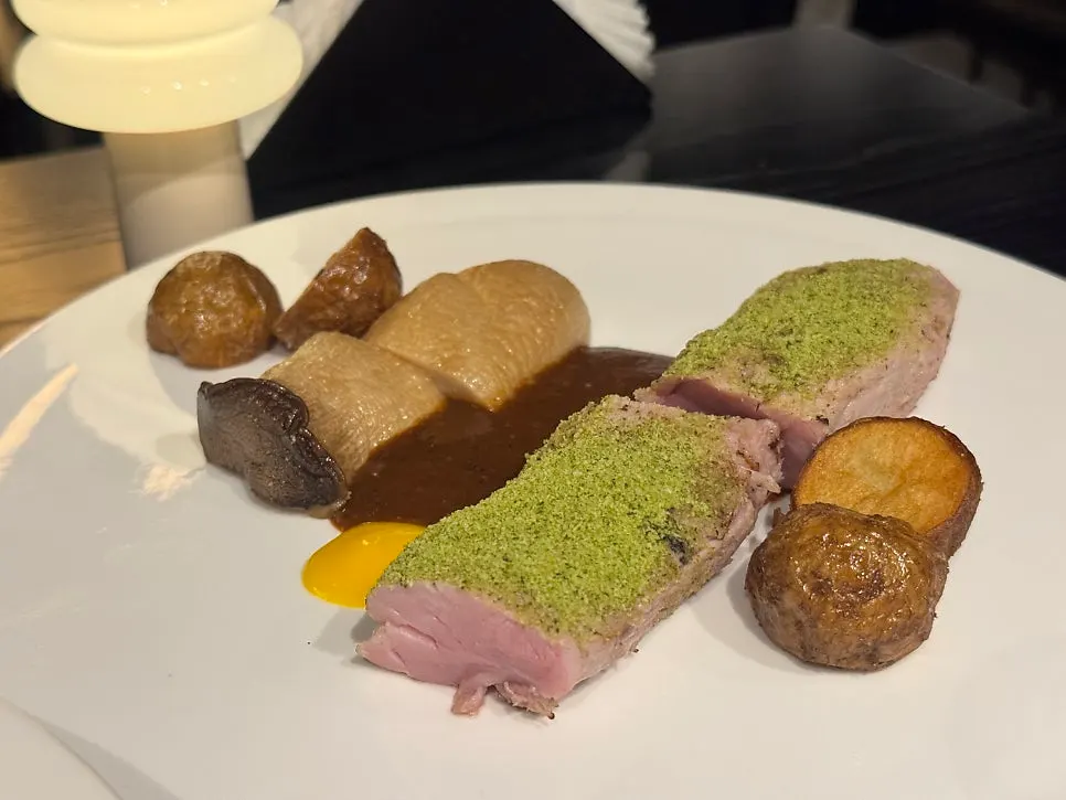 Plated Jeju black pork tenderloin steak main course