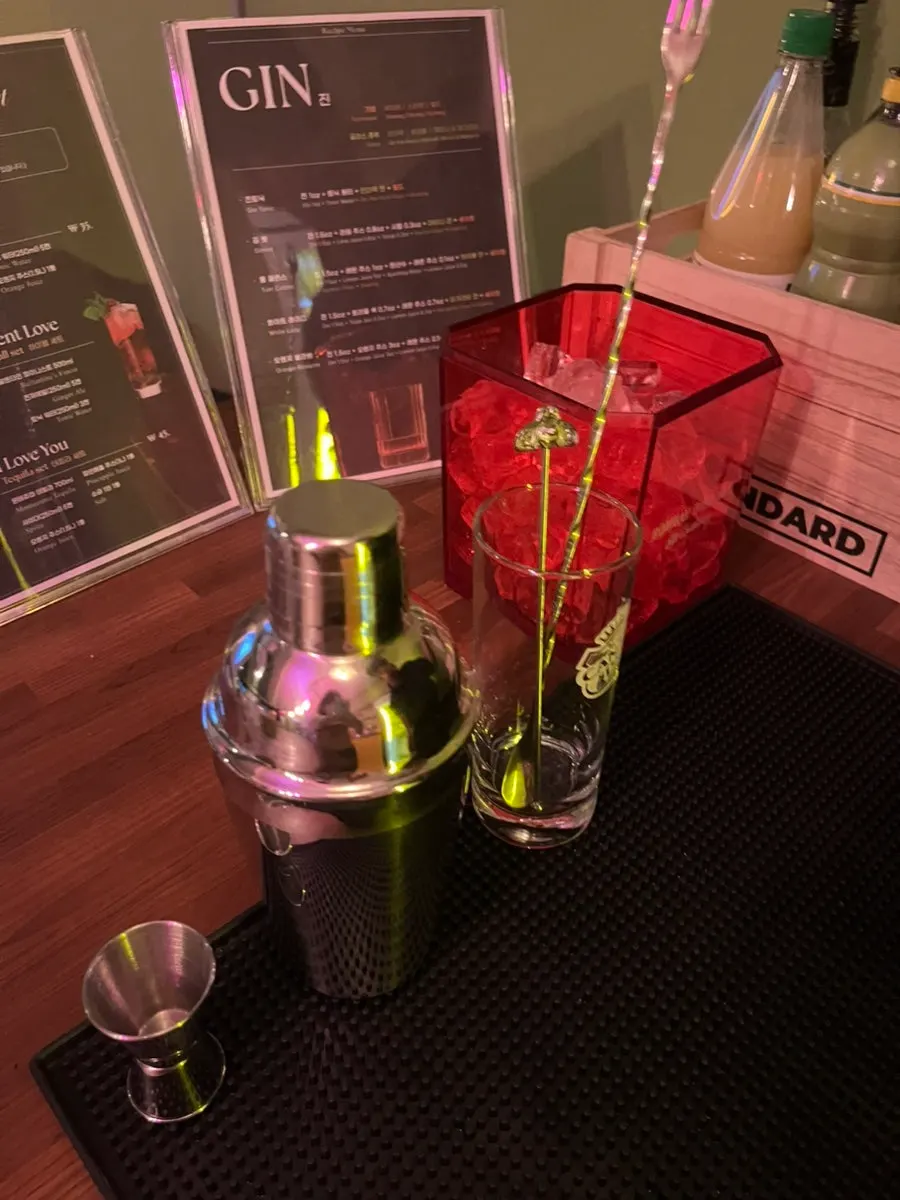 Cocktail shaker, jigger and long spoon