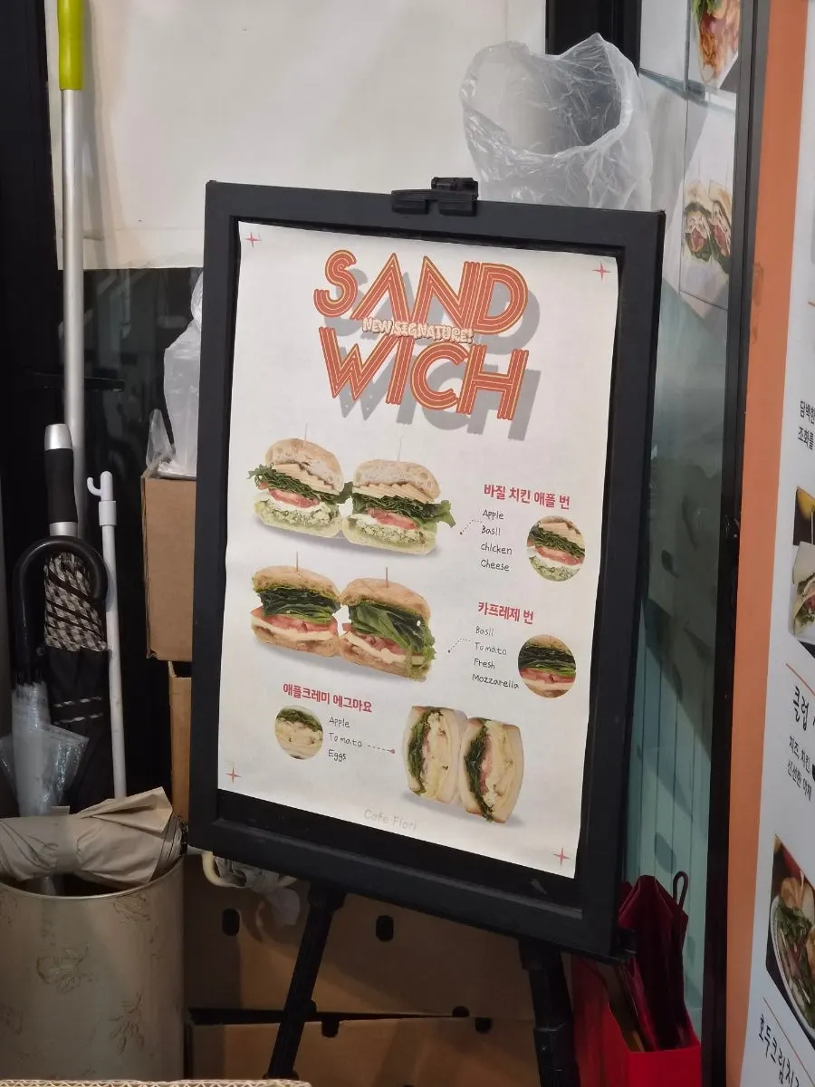 Sign explaining antibiotic-free chicken breast and healthy breads