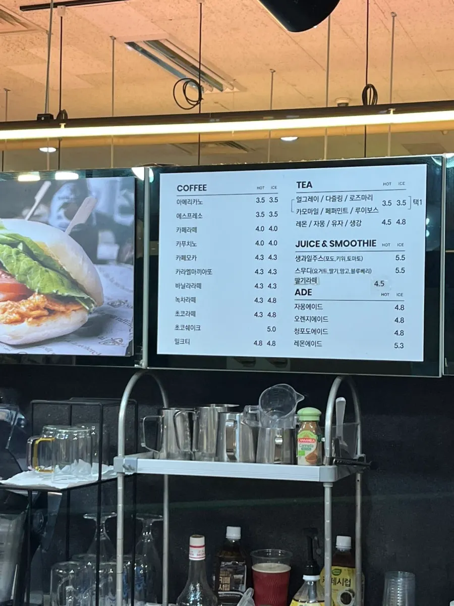 Menu board showing sandwich prices