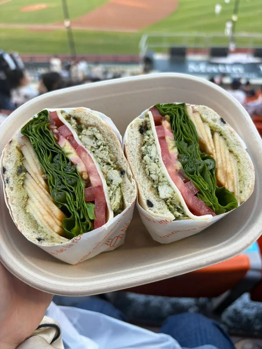 Cross-section of the basil chicken apple bun swapped to ciabatta