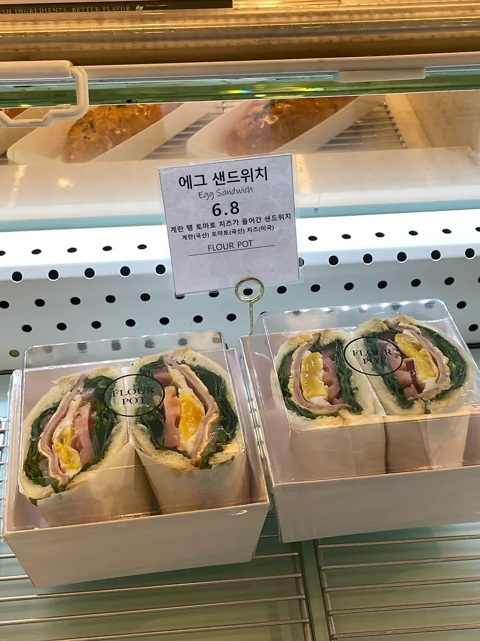 샌드위치 세트 가격이 적힌 메뉴판