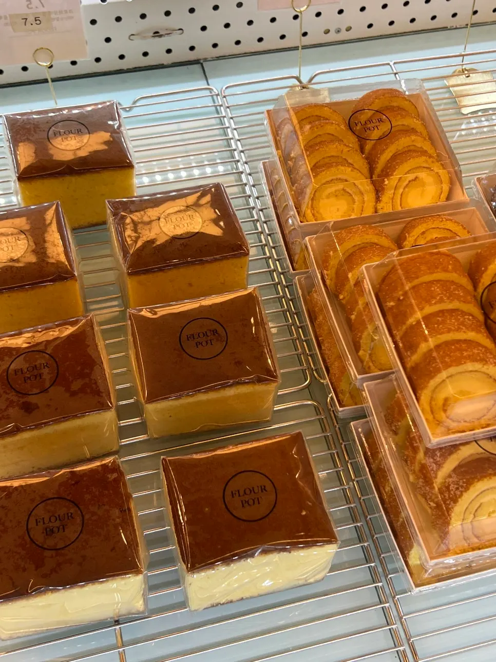 Variety of mini cake designs on display