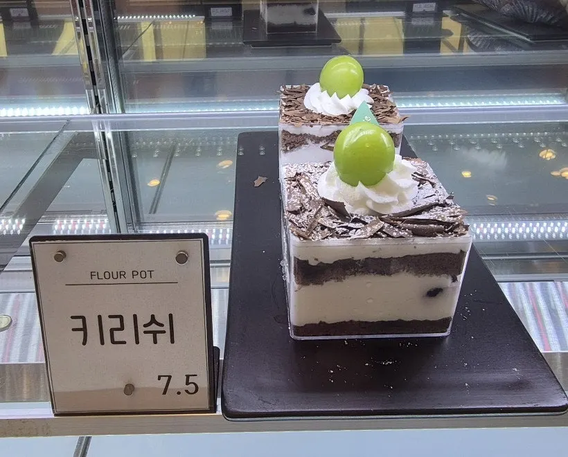 Cake slices arranged inside the display case
