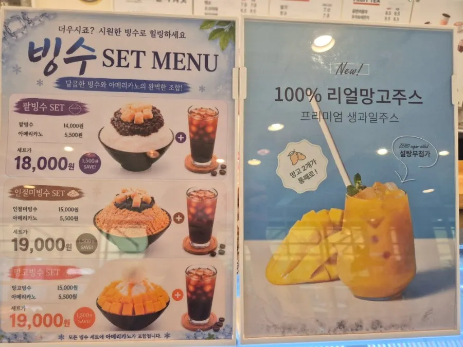 Menu board listing seasonal items and real mango juice
