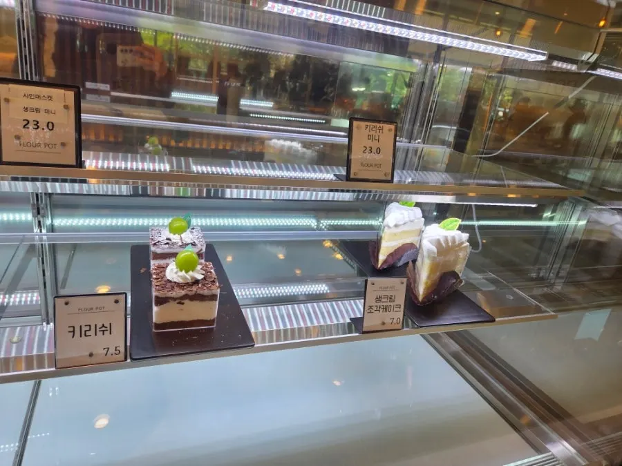 Assorted desserts in the display case