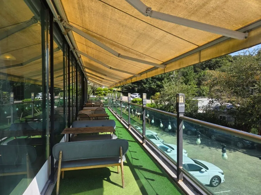 Table seating on the second floor of Flowerpot Cafe