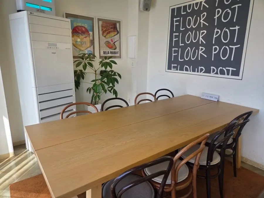 Clean third-floor tables set up mainly for groups
