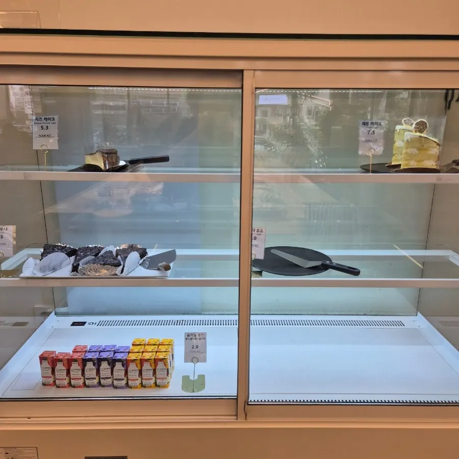 Display case with campagne and sandwiches