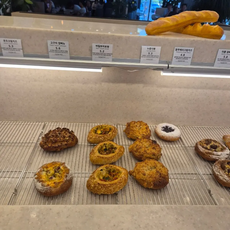 Display case with much of the bread already sold out