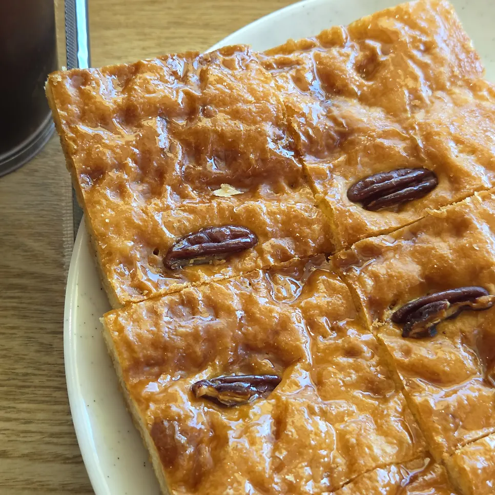 Pecan-topped alligator pastry at Flowerpot Cafe