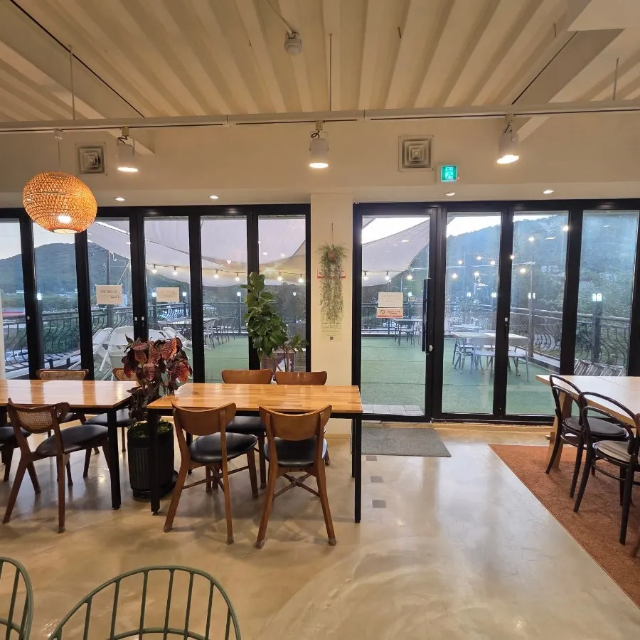 Third-floor indoor seating and the view outside