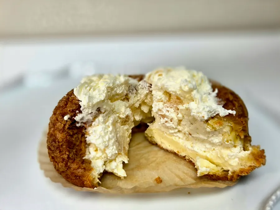 Cross-section of the cream cheese apple choux showing apple filling