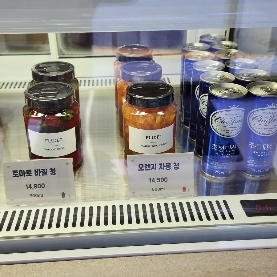 Bottles of strawberry, passionfruit and other fruit syrups