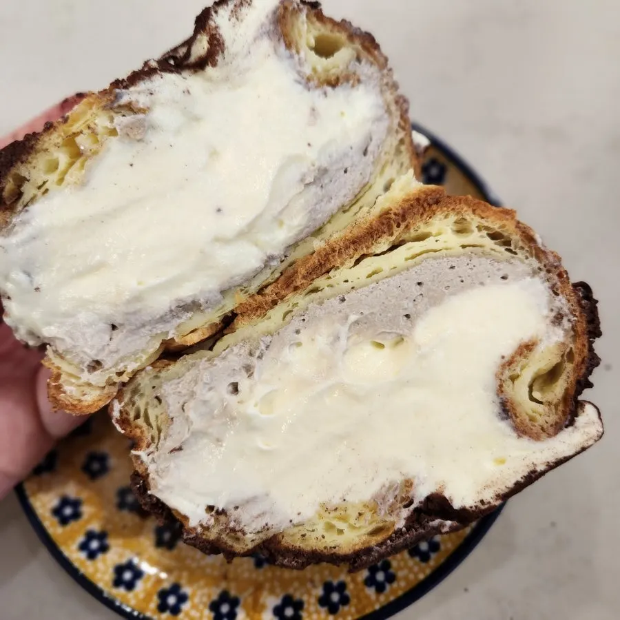 Cross-section of tiramisu choux with mascarpone cream