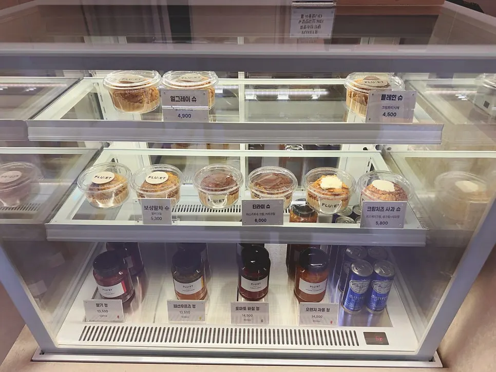 Handmade fruit syrups on display at FLU:ET