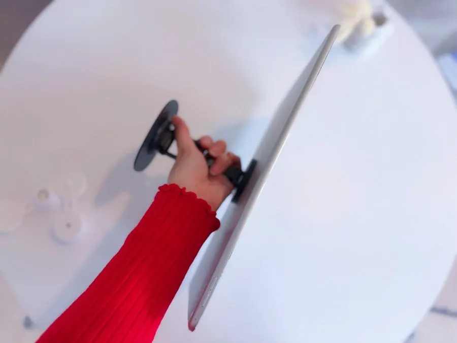 iPad stand with a magnetic ring attached